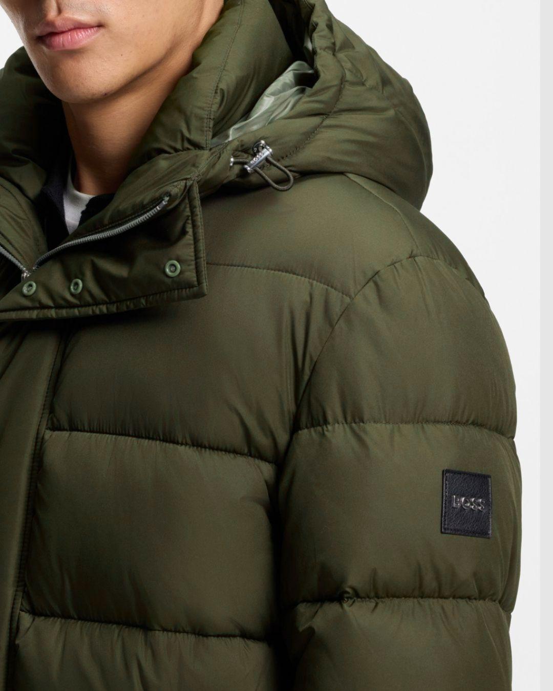 Chaqueta larga acolchada repelente al agua con capucha