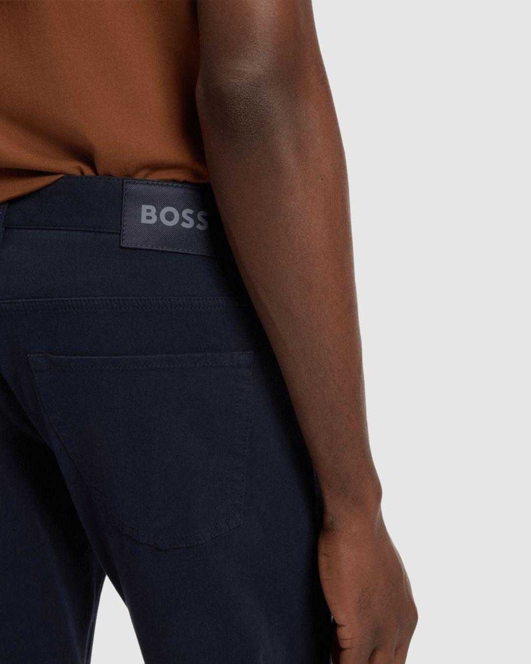 Pantalones Delaware slim fit de sarga de algodón elástico